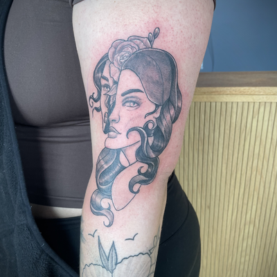 black and grey lady face on arm — tattoo by Corinne Clapper, Providence, Rhode Island