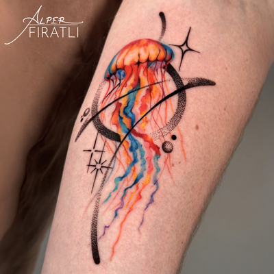This jellyfish tattoo blends watercolor movement with geometric structure—delica… — tattoo by Alper FIRATLI, Los Angeles, California