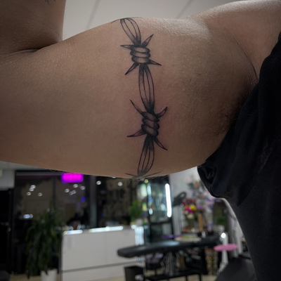 Complete barb wire wrap around 
#tattoo
#tattoos — tattoo by Jc TheArtist, Downey, California