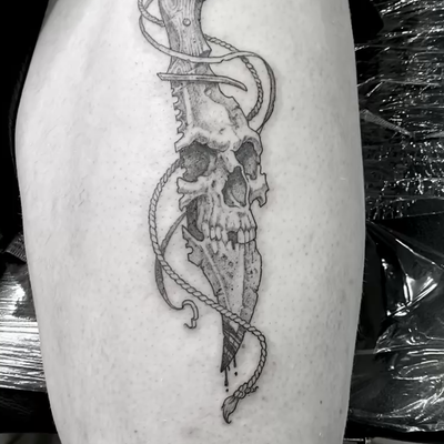 skull knife from The Chicago Tattoo and Arts Festival 2026 — tattoo by Sam Robichaud, Los Angeles, California