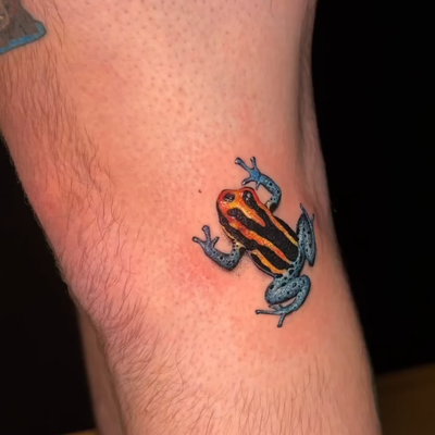 Poison dart frog yesterday @obsidianmoontattoo 💜 we’re still figuring out a nam… — tattoo by Paige Chartrand, Goffstown, New Hampshire