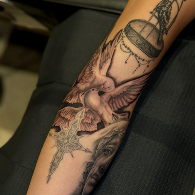 Doves for my friend Celine — tattoo by Saint ., New York, New York