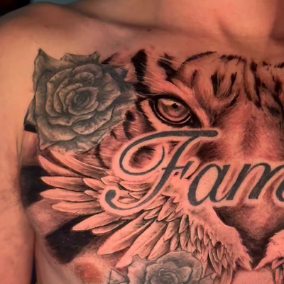 Work in progress added the tiger and wings going to be repurposing the roses and… — tattoo by Josh Fesik, Willow Grove, Pennsylvania