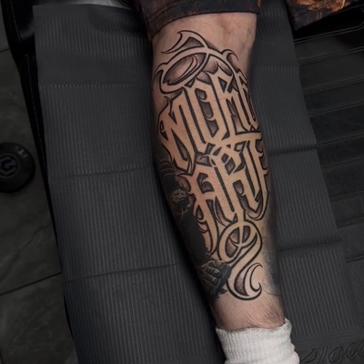 leg lettering — tattoo by Mike Wayne, Phoenix, Arizona