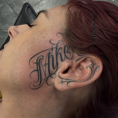 FACE and EAR both done by me 

healed ear — tattoo by Mike Wayne, Phoenix, Arizona