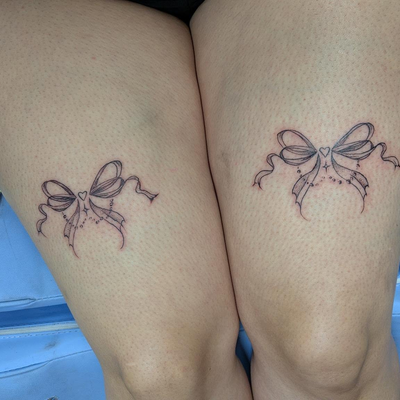 Look at these absolutely stunning thigh bows I got to do 🎀🩷✨
#perfectpair #bow… — tattoo by Makayla Wallace, Shreveport, Louisiana