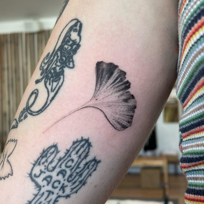 Tiny custom ginkgo leaf⚡️
Love to do these nature inspired designs!🍁 
/
DM to b… — tattoo by Raivo Broks, Beverly Hills, California