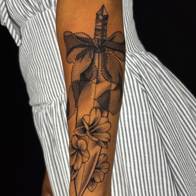 Got to do one of my flash with an addition of flowers at the tip :) — tattoo by Morgan Penton, Dallas, Texas