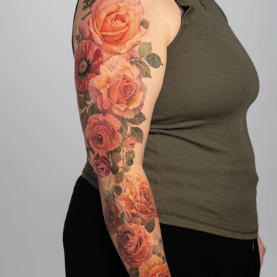 Healed floral arm sleeve — tattoo by Sagdiana  Kashaeva, Boston, Massachusetts
