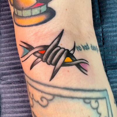 Touched up an old tattoo (not mine) for @teagunz__ 
Slide for the before 👉
Barb… — tattoo by Greg Sternin, Gilbert, Arizona