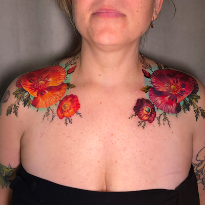 A couple of differently colored but symmetrical composition color poppies on the… — tattoo by Irina Shapiro, Somerville, Massachusetts