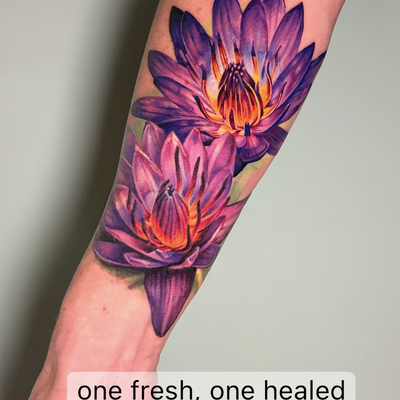 A couple color realism purple lotuses on the inner forearm. — tattoo by Irina Shapiro, Somerville, Massachusetts