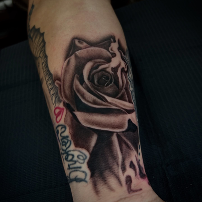 Rose gap filler for my mother adding on to it soon🙌💯 get your gaps filled in b… — tattoo by Nicolas Caselin, San Jacinto, California