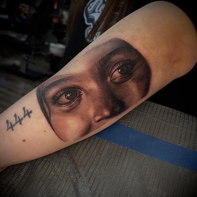 First (partial) portrait in the books🫡‼️ clients niece on her arm thanks for th… — tattoo by Nicolas Caselin, San Jacinto, California