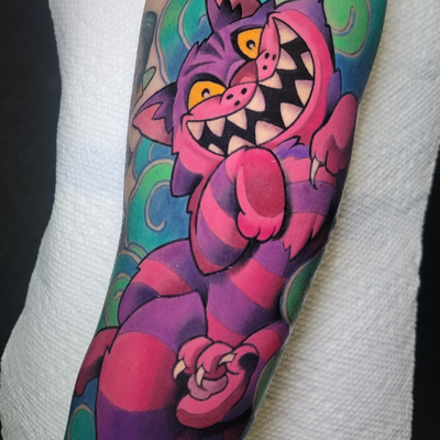 Tattoo by shaunflinnTattoos: This cheshire cat is part of a full sleeve, more to come!