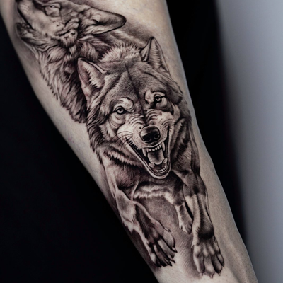 wolves — tattoo by Cihan Pohrenk, Los Angeles, California