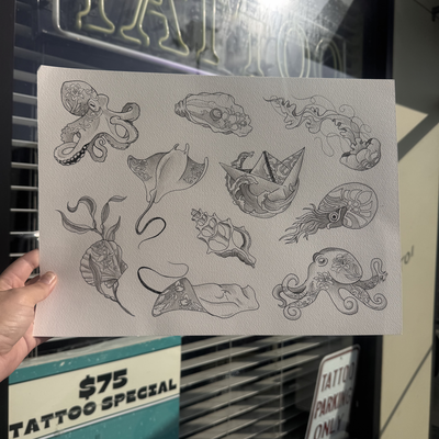 Recently finished this ocean-inspired flash sheet featuring stingrays, octopus, … — tattoo by Jessica Hurteau, Newport Beach, California