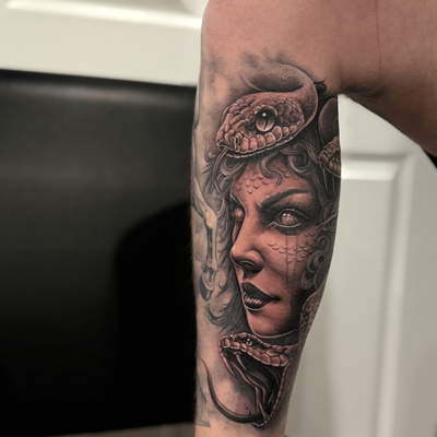Tattoo by 32tattoos: Medusa. Black & Grey realism. Every scale, every shadow, every detail crafted wi…
