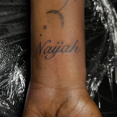 Fire custom name tattoo 🔥💪🏾
📲Text 7183079147 to book your appointment today!… — tattoo by Alivia Mazile, Valley Stream, New York