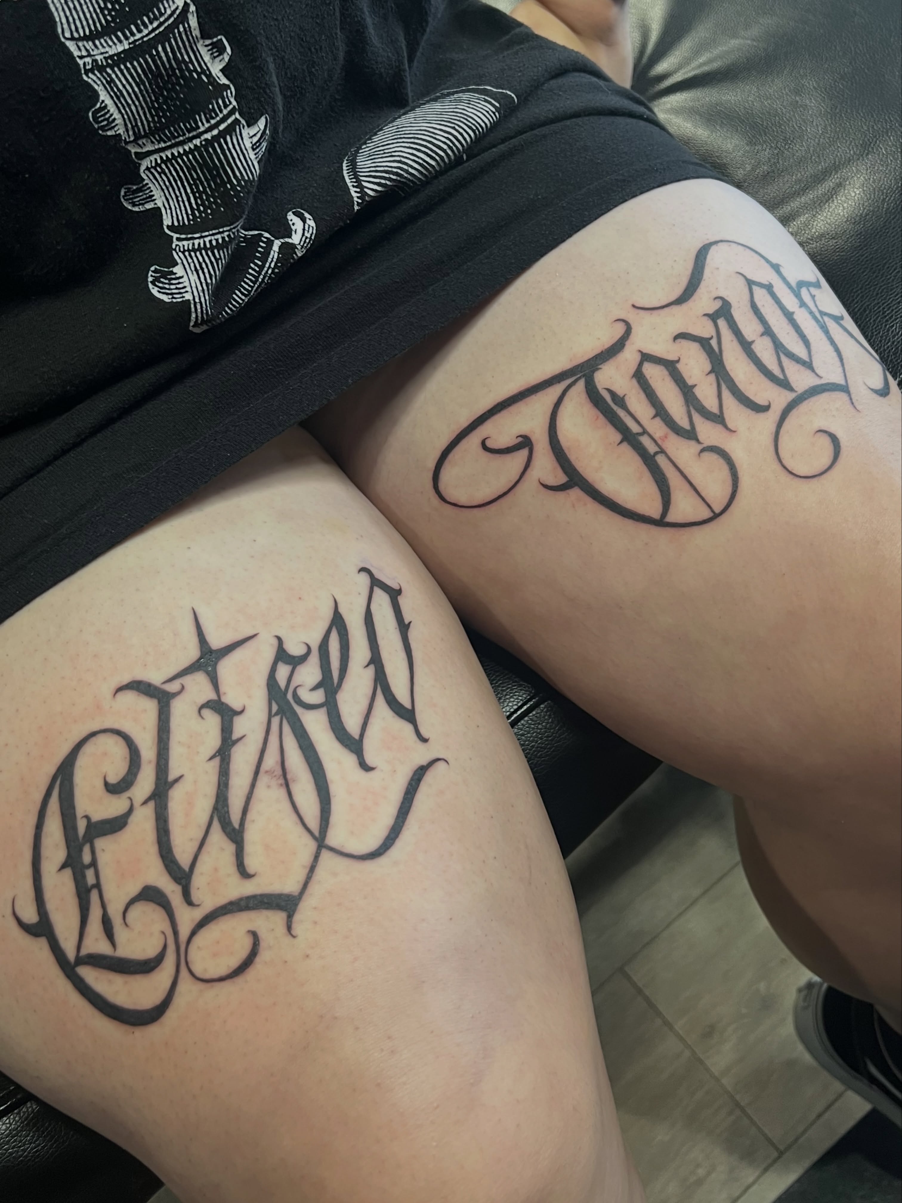 Custom “Eliseo & Tanok” dedicated to her son. I want to do more lettering so hit… — tattoo by Quan G, Union City, California