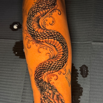 Built for the flow of the arm. 🐍

Really had fun with this one — twisting the b… — tattoo by Toaster Blix, Banning, California