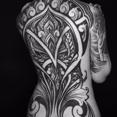 Reposting this because ig thought it was too spicy. Healed piece on @erikalamoth… — tattoo by Dustin Burt, Seattle, Washington
