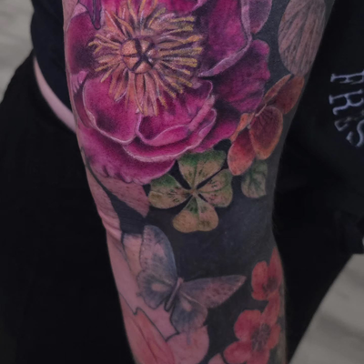 Added another flower and clover to this in-progress sleeve

#colortattoo #colorf… — tattoo by Kyle Soden, Honesdale, PA