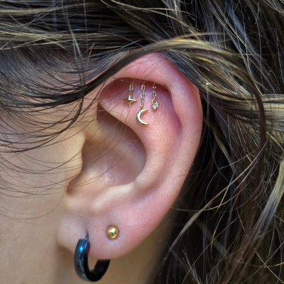 Featuring the exquisite 14k gold Cassiopeia end from Modern Mood, accented with … — tattoo by Kyle Soden, Honesdale, PA