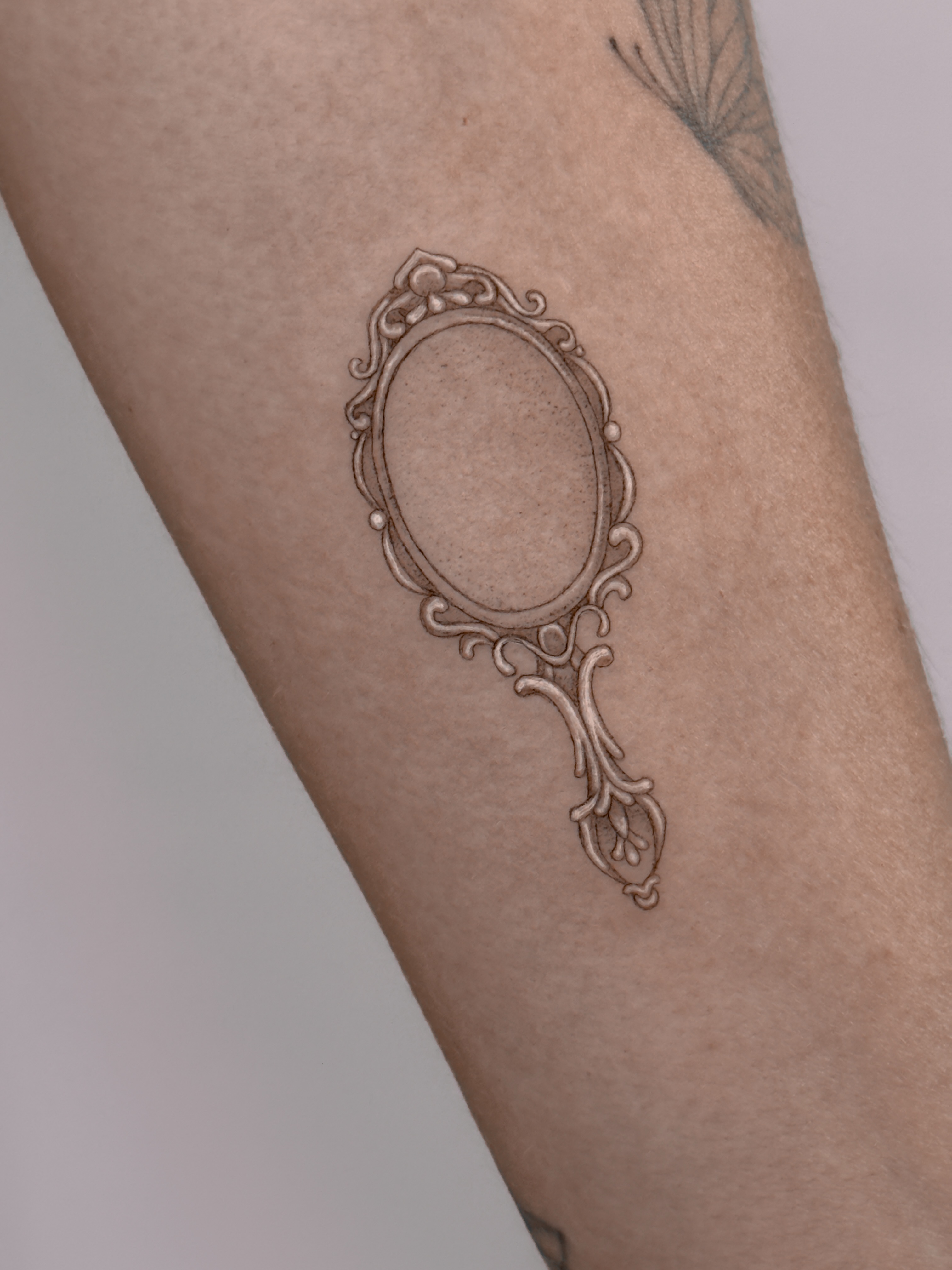Mirror, mirror. ✨

Delicate single needle work with soft details and timeless el… — tattoo by Agnė Kastanauskaitė, Los Angeles, California