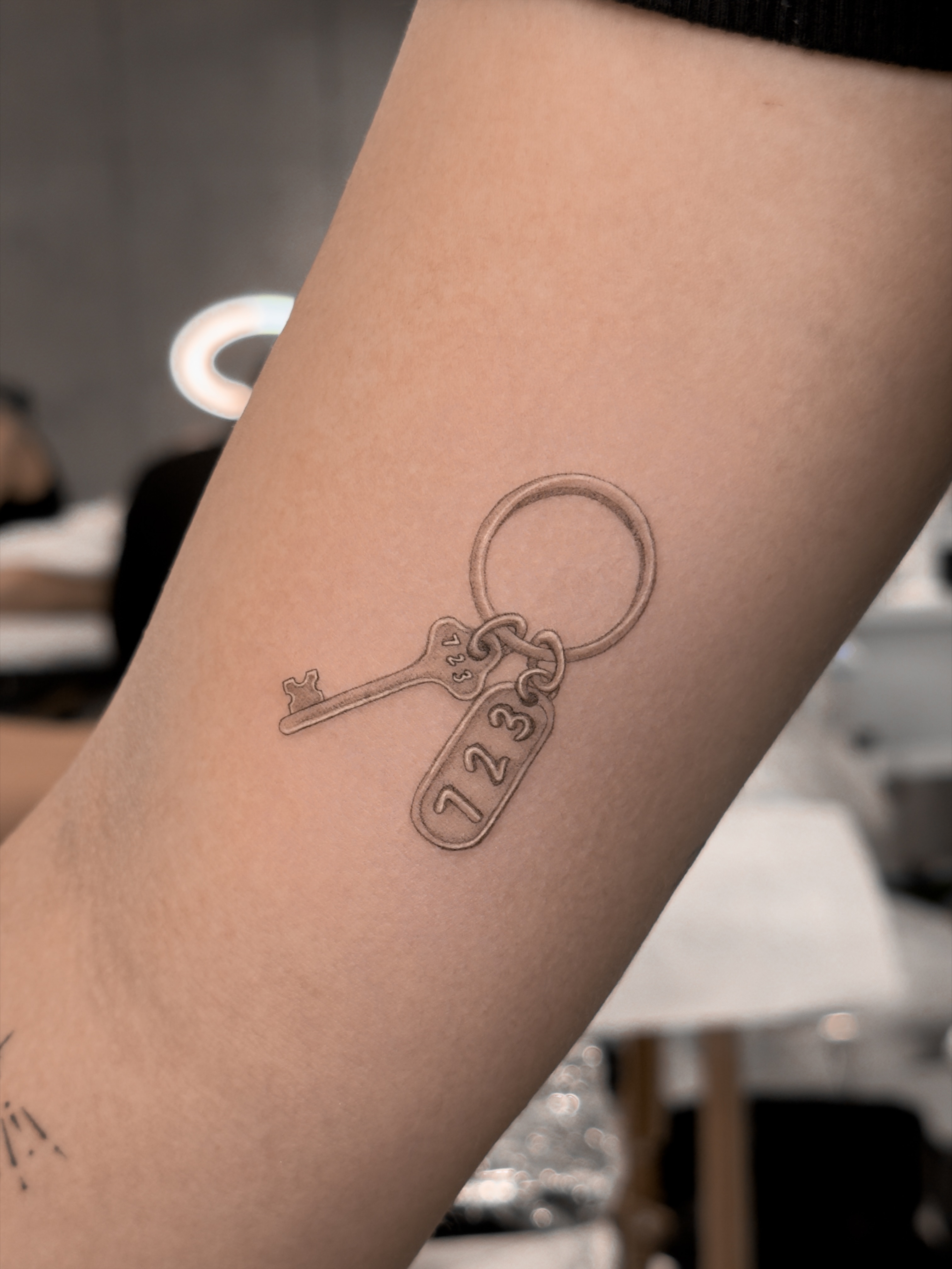 Favorite memories, locked in. 🗝️
Done with single needle. 
.
.
.
#finelinetatto… — tattoo by Agnė Kastanauskaitė, Los Angeles, California