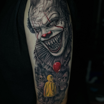 Another nightmare brought to life in black and grey. Pennywise with a little sel… — tattoo by Dorian Perches, Banning, California