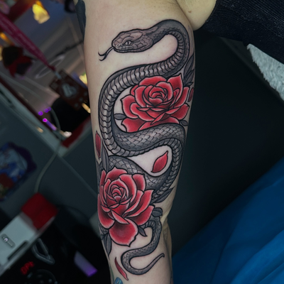 Another one finished at Tattoo Asylum. Love mixing black and grey realism with b… — tattoo by Dorian Perches, Banning, California