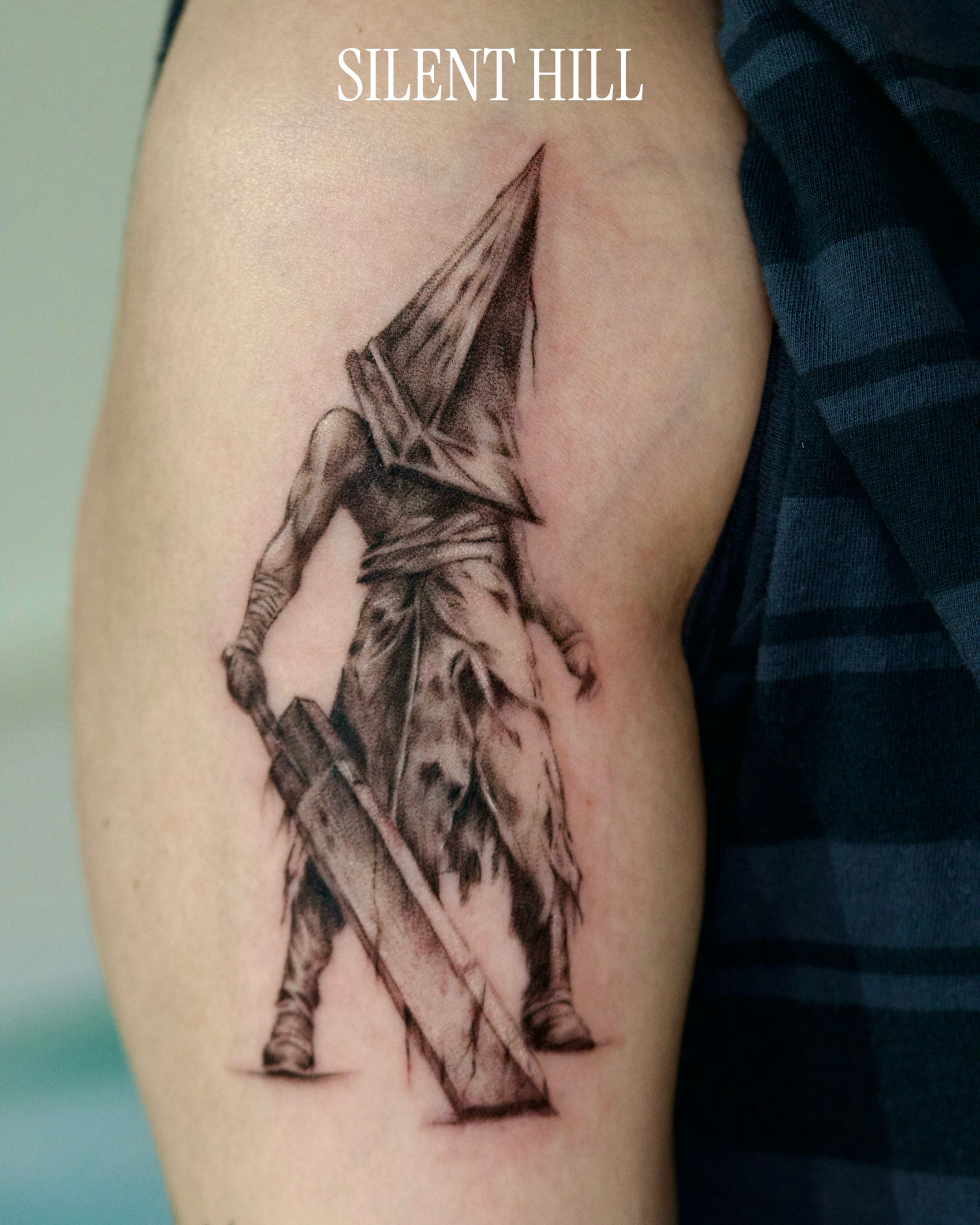 Having fun tattooing this character called Pyramid Head from a survival horror v… — tattoo by Vanessa Kee, Singapore, singapore
