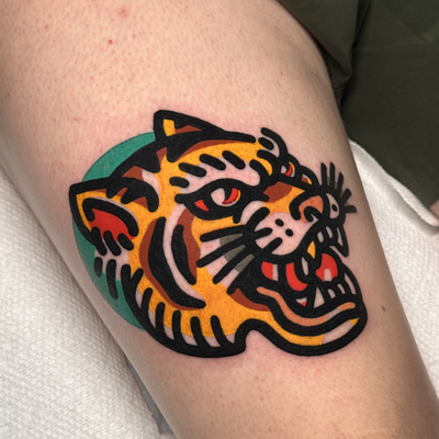 Modern bold tiger head — tattoo by Jitan Forcier