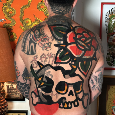 Modern bold backpiece blastover — tattoo by Jitan Forcier