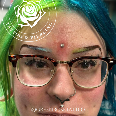 More piercing work from @stephensteelstudios including a Third Eye Microdermal a… — tattoo by Stephen Marion, Holyoke, Massachusetts
