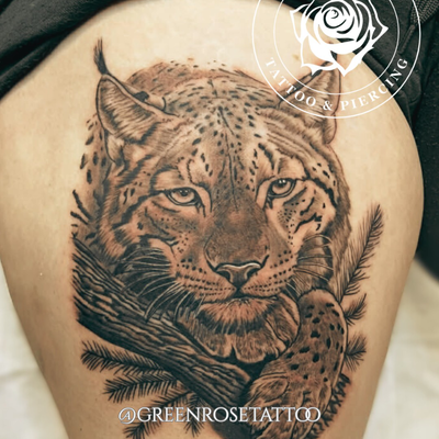 Lynx tattoo recently done by @inkboylu. Luis is here every Thursday through Mond… — tattoo by Stephen Marion, Holyoke, Massachusetts