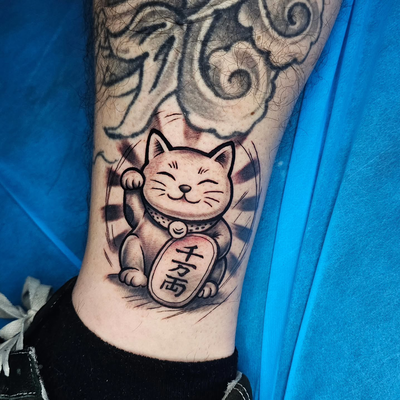 Did this fun good luck cat the other day. 

DM to book — tattoo by Isaac Kristofka, Banning, California