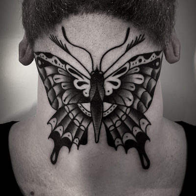 Moth neck tattoo — tattoo by Christian Otto, Beverly Hills, California