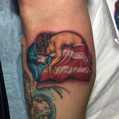 Baby sleeping on Puerto Rico flag — tattoo by DiBUJO TV