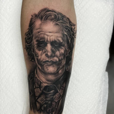 Joker portrait by artist: @dev_walden . Follow him for more black and grey reali… — tattoo by Alberto  Valladares, Laguna Hills, California
