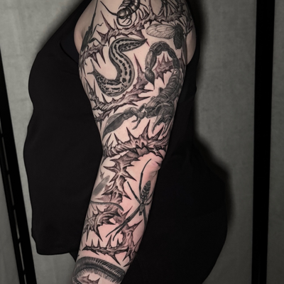 So many bugs and so many hours of work into this arm.  We decided to add some fr… — tattoo by Ryley  Smith, Bozeman, Montana