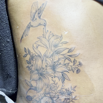 floral custom design on ribs — tattoo by 3 Eleven, Hartford, Connecticut