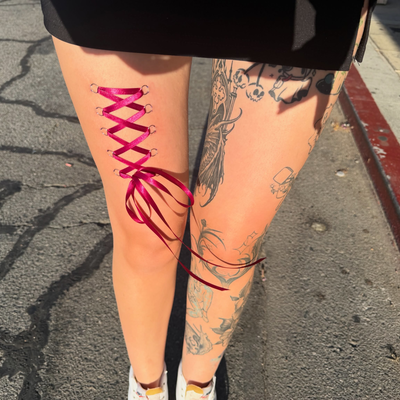 Had a blast lacing up my own leg with 10 20g hoops! Can’t wait to do this one ag… — tattoo by Carlee Wilkinson, Banning, California