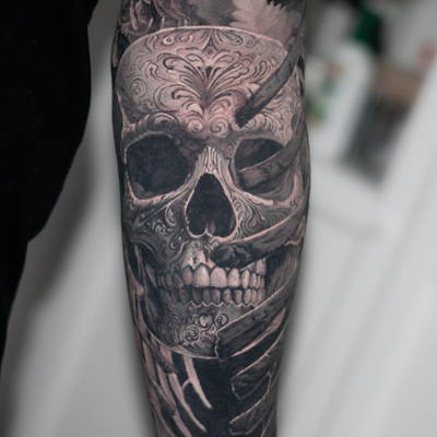 Skulls are always going to be one of my favorite things to tattoo.  This piece g… — tattoo by Mike FisherDubois