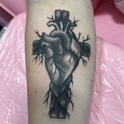 had fun with this anatomical heart and wooden cross tattoo done for a client wit… — tattoo by Chrystal Nevius, Orlando, Florida