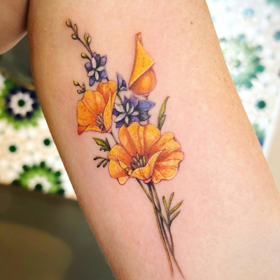 California poppies and larkspur for Amy 🧡

#poppytattoo #californiapoppies #cal… — tattoo by Vickie Chiang, Los Angeles, California