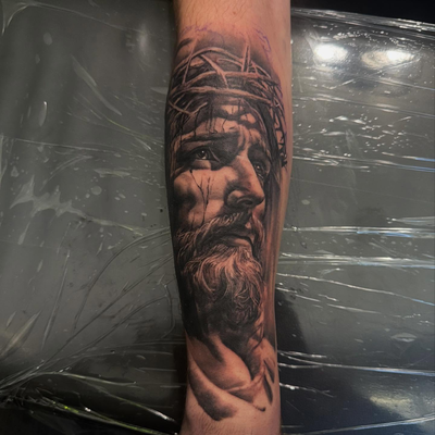 Couple days late haha but just finished up this Jesus piece on Dylan. Thank you … — tattoo by Tom Doyle, Phoenix, New York