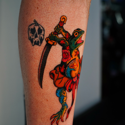 kaeru charm for protection and good fortune done in full color.
•
•
•
•
• @hurtc… — tattoo by Joel Soria, Tucson, Arizona