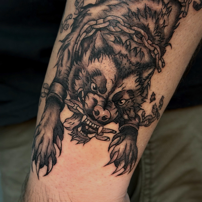Fenrir, the monstrous wolf of Norse mythology, was born of Loki and prophesied t… — tattoo by Joel Soria, Tucson, Arizona
